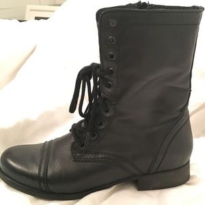 Black Steve Madden combat boots.